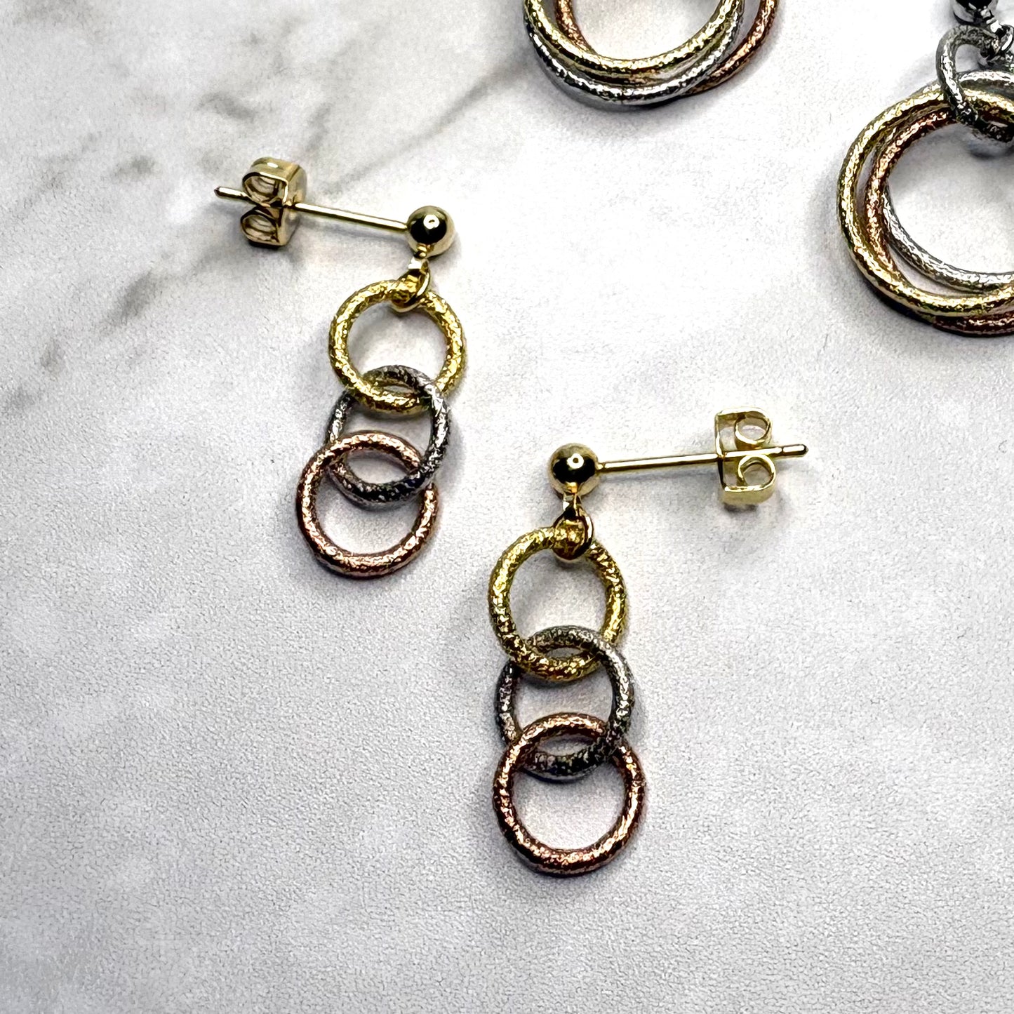 COMBINATION EARRINGS